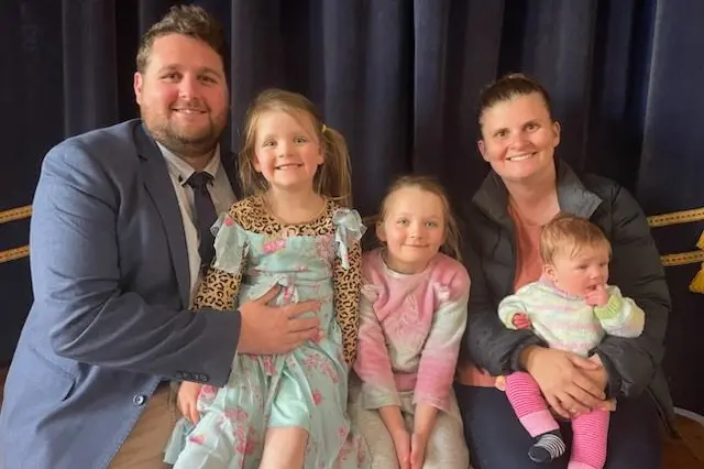 New Presbyterian minister Len Woonings with his family in Cowra.\\n