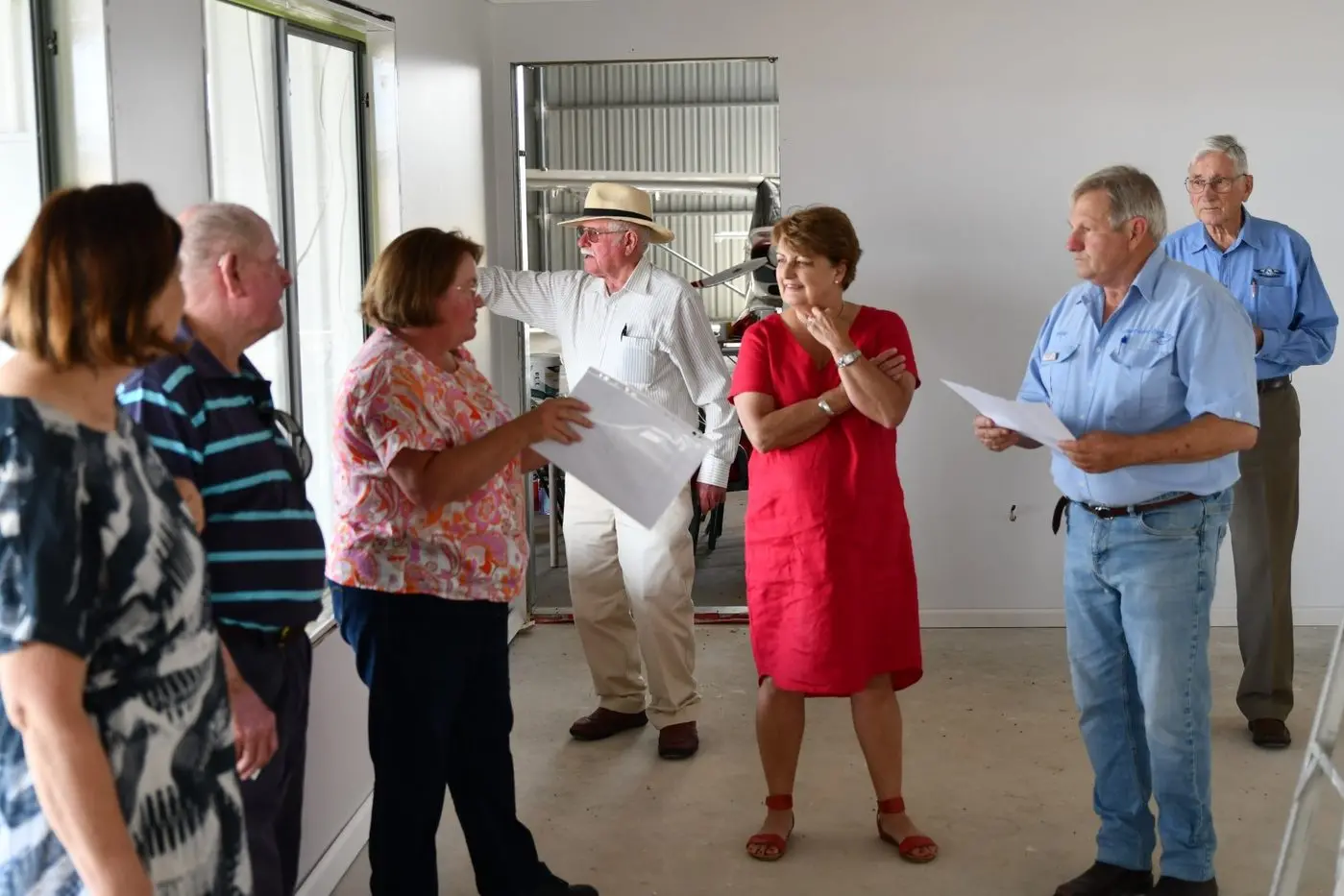 RECIPIENTS: Former Mayor Ruth Fagan with Dave Shaw and members of the Cowra Aero Club who received a grant in the last round of funding. Photo by Dane Millerd.