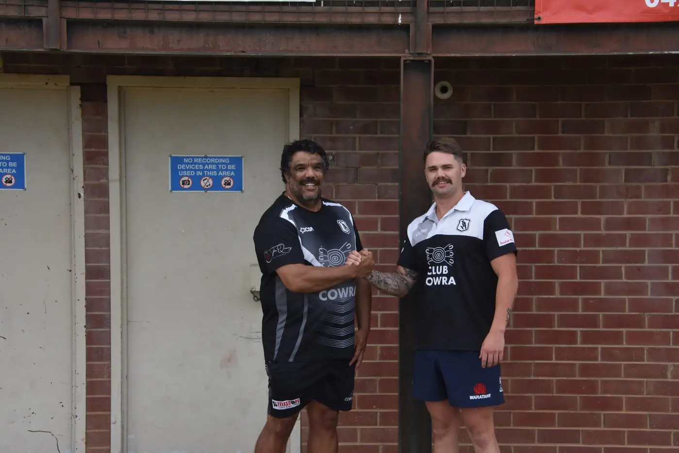 Coach Phil Ingram with club captain, Jake Slattery.