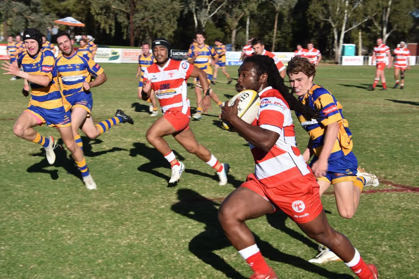 Jason Paul - assisted by a solid centre - makes an early break. Photo: Dan Ryan.