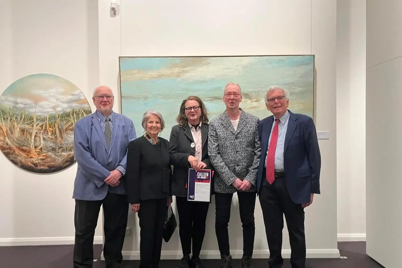 CALLEEN WINNER 2024: Calleen Art winner Amanda Penrose Hart (middle) with Brian Langer, Jenni Fagan, Richard Perram OAM, and Peter Fagan. Photo supplied. 
