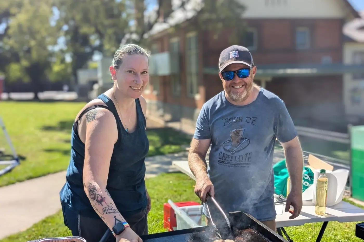 DEMOCRACY SAUSAGE: Stacey and Andrew keeping voters fed at Cowra Public Scool. Photo Dan Ryan