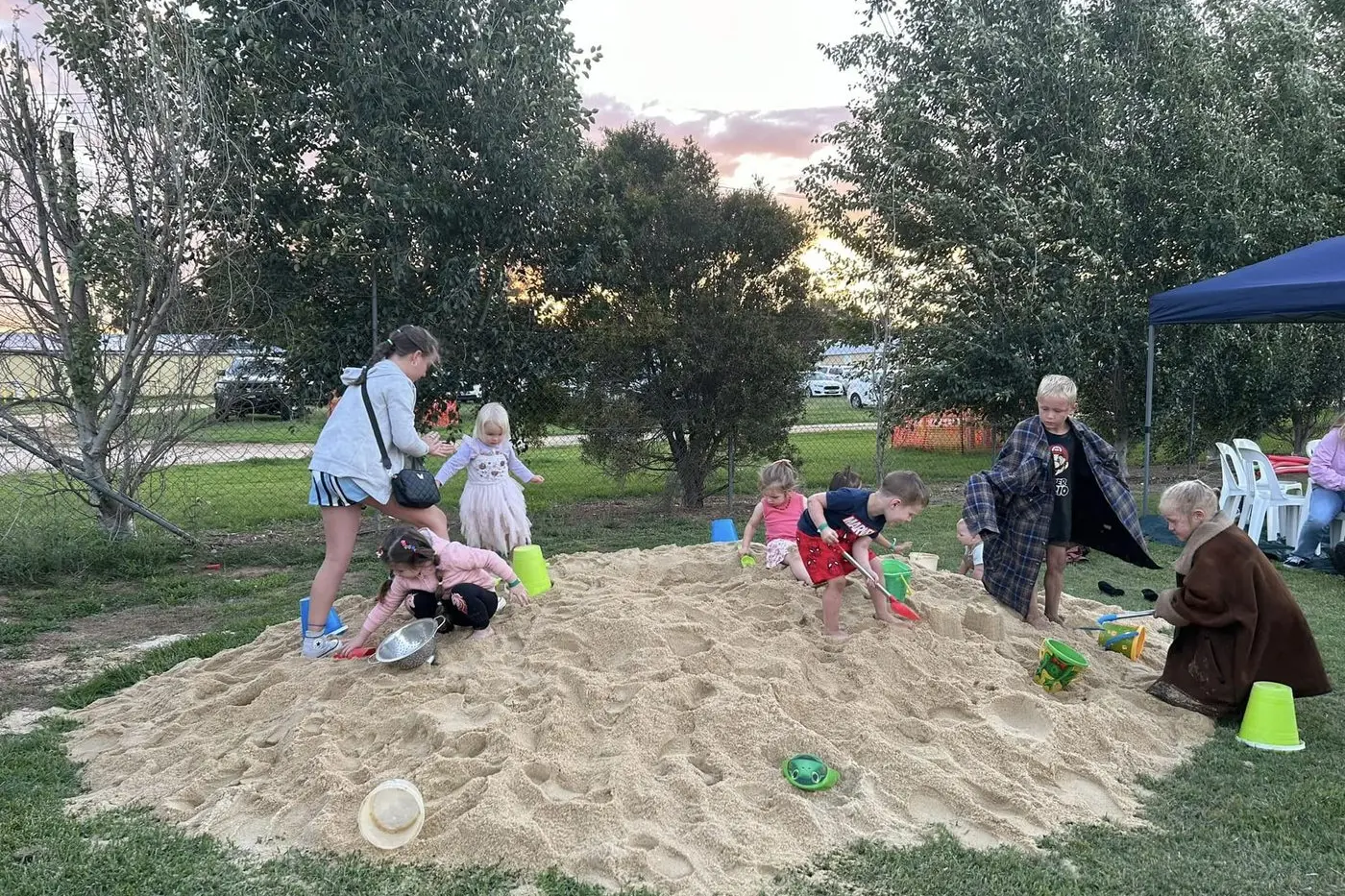 DIG IN: last year\\'s sandpit at the beach party.