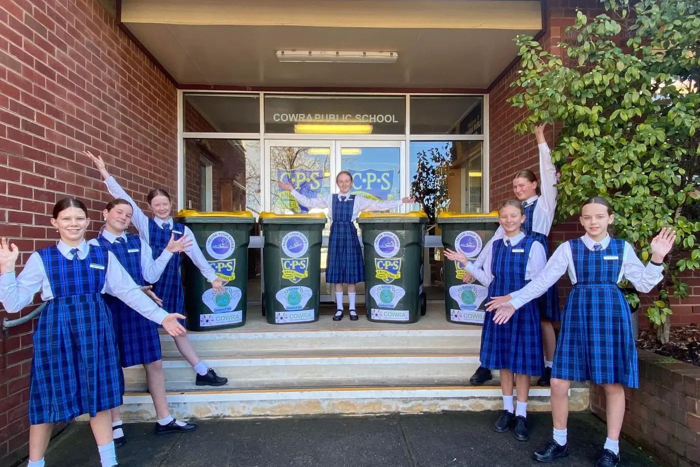 Ingrid Smith, Ava Gee, Zoe Morrison, Jessica Chase, Sophie Scammell, Evie Johnstone and Madison Whitty along with other students from St. Raph\\'s, Mulyan Public and Cowra High have been donating shoes for the Re-Use Your Shoes campaign. Photo courtesy of Cowra Public School.