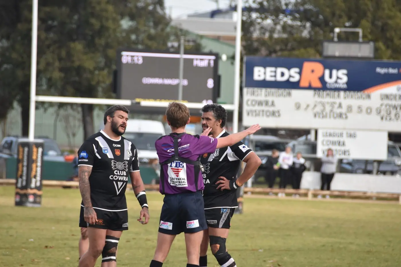 Sam and Stephen Ingram, and referee Sonny Eastwood giving Sam 10 minutes in the sin bin.