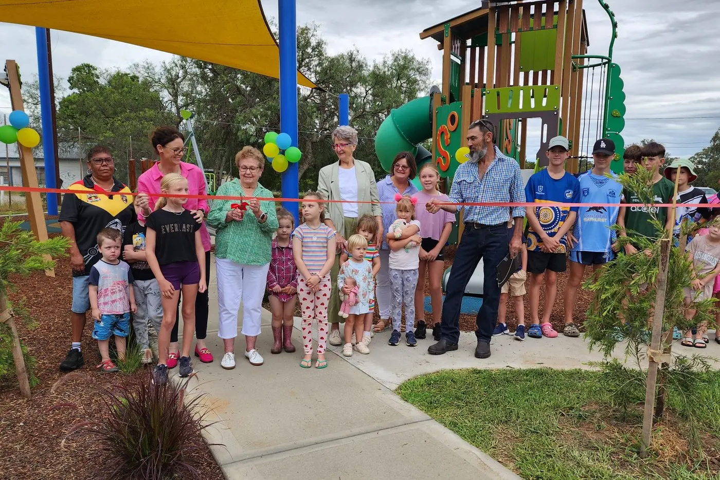 Valued member of the Koorawatha Progress Association, Lorna Langfield, had the ribbon cutting honours at the opening of the new playground in Memorial Park, Koorawatha.