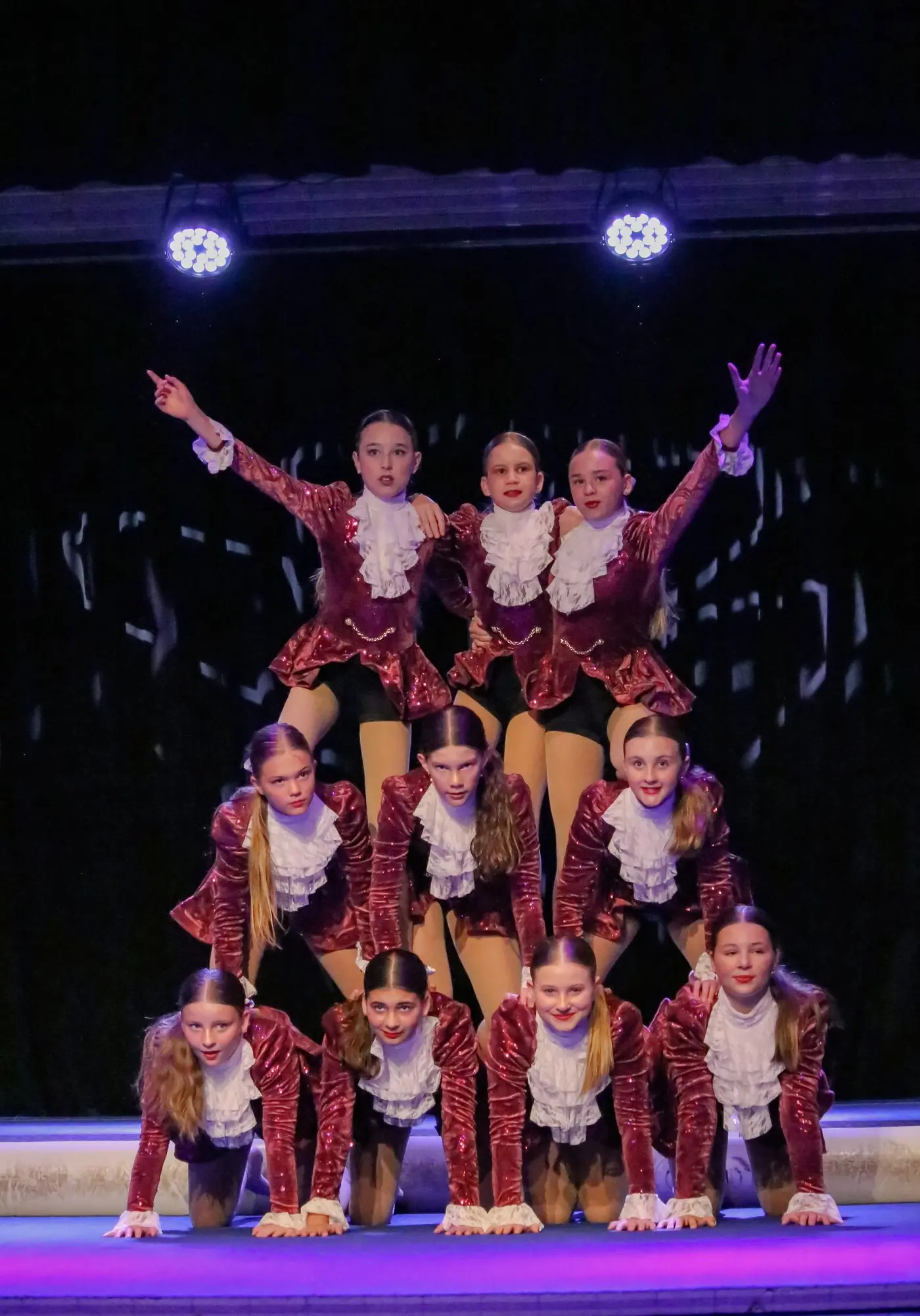 One of Cowra Ballet School\\'s acro classes at the 2024 end of year concert.