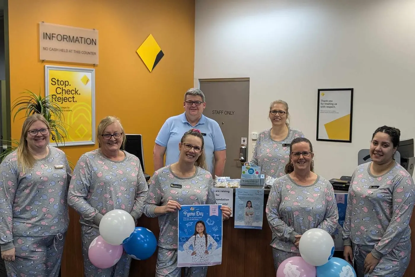 Cowra Commonwealth Bank staff showing their support for the Pyjama Foundation.