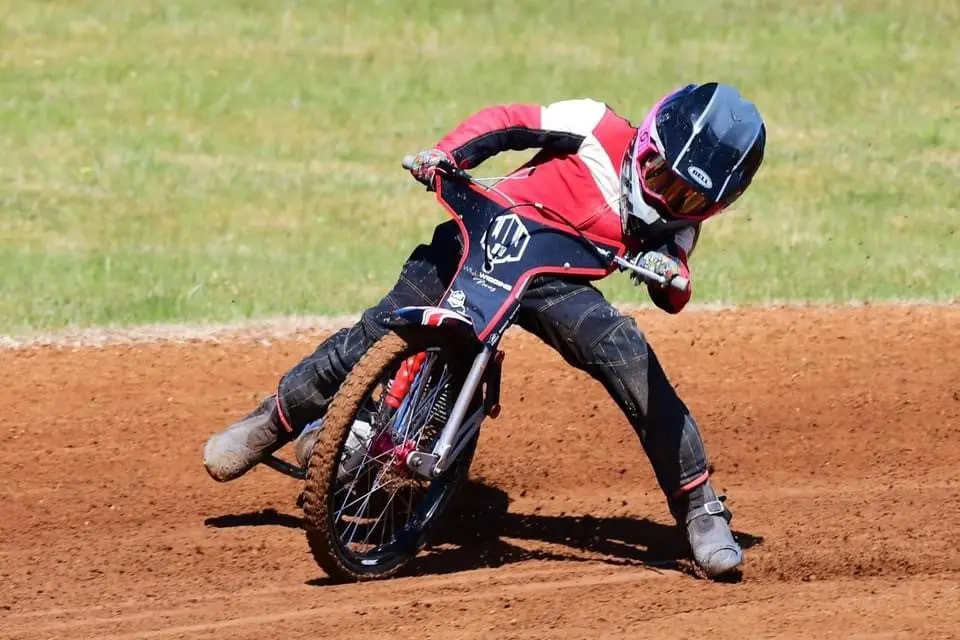 SLIDING HOME: It was a big day of action at Woodstock Speedway last weekend. Photo by Allan Brockman.