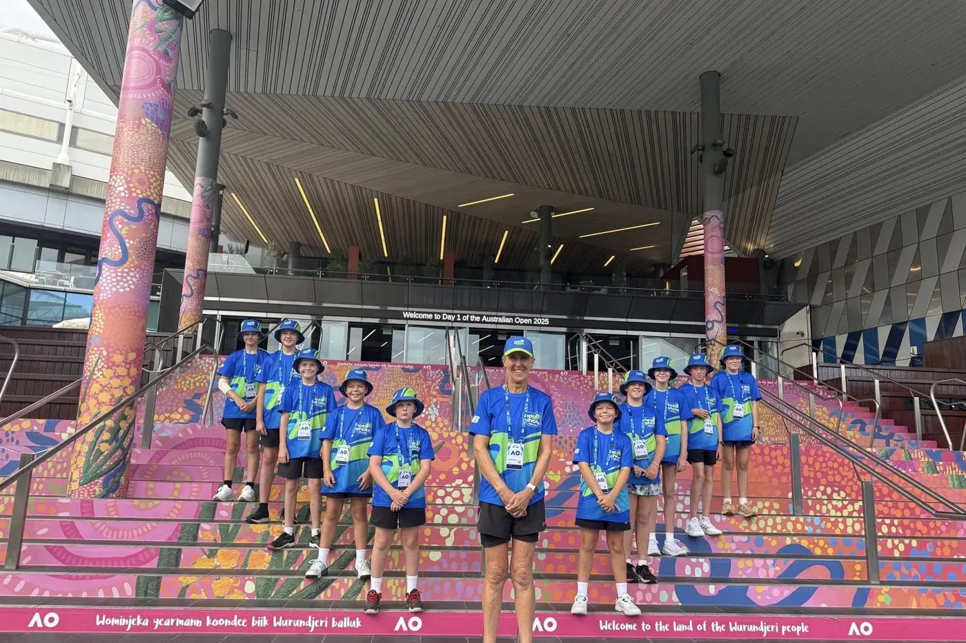 Helen Garratt with her young tennis players