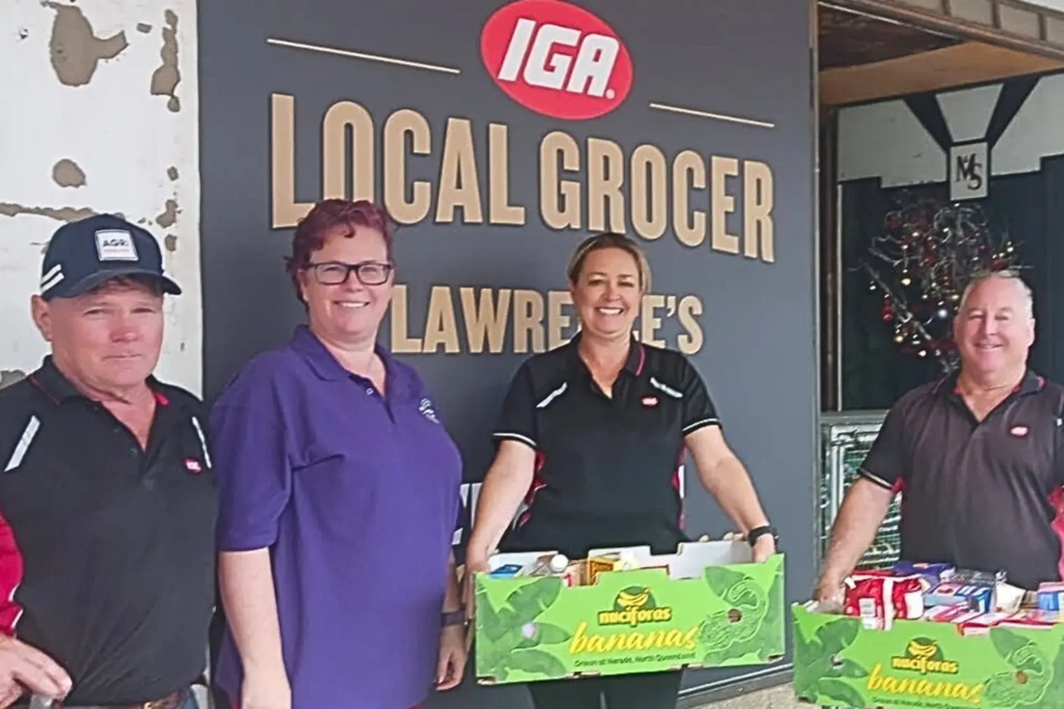 <p>Johnny Lawrence, Beck Carter, Michelle Fisher and Peter Watt working on the Christmas Hampers. PHOTO: Supplied</p>\\n