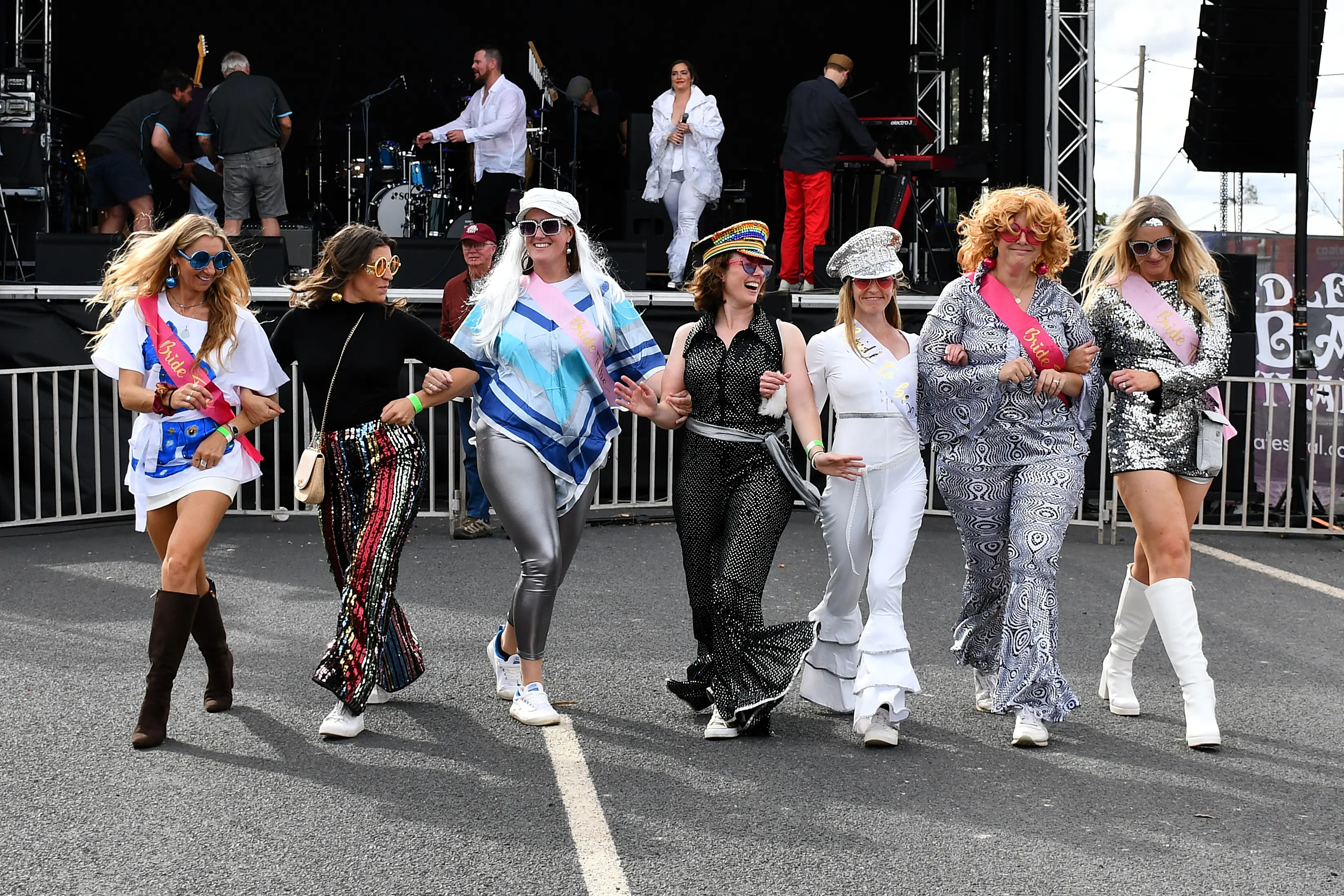 <p>These ladies travelled from Sydney to strut the catwalk and take-in this year\\'s resurrected Trundle ABBA Festival that took place on Saturday. PHOTO: Jenny Kingham</p>\\n
