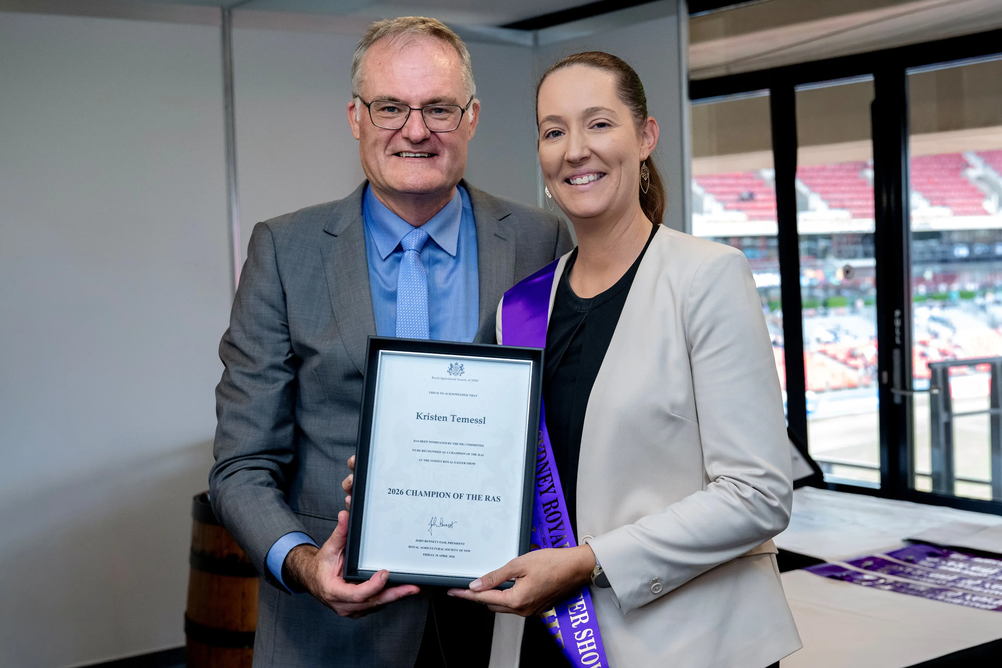 <p>Chief Executive Brock Gilmour congratulated Parkes farmer and teacher Kristen Temessl on being one of this year\\'s Champions of the Royal Agricultural Society of NSW, announced at this year\\'s Sydney Royal Show. PHOTO: RAS NSW</p>\\n