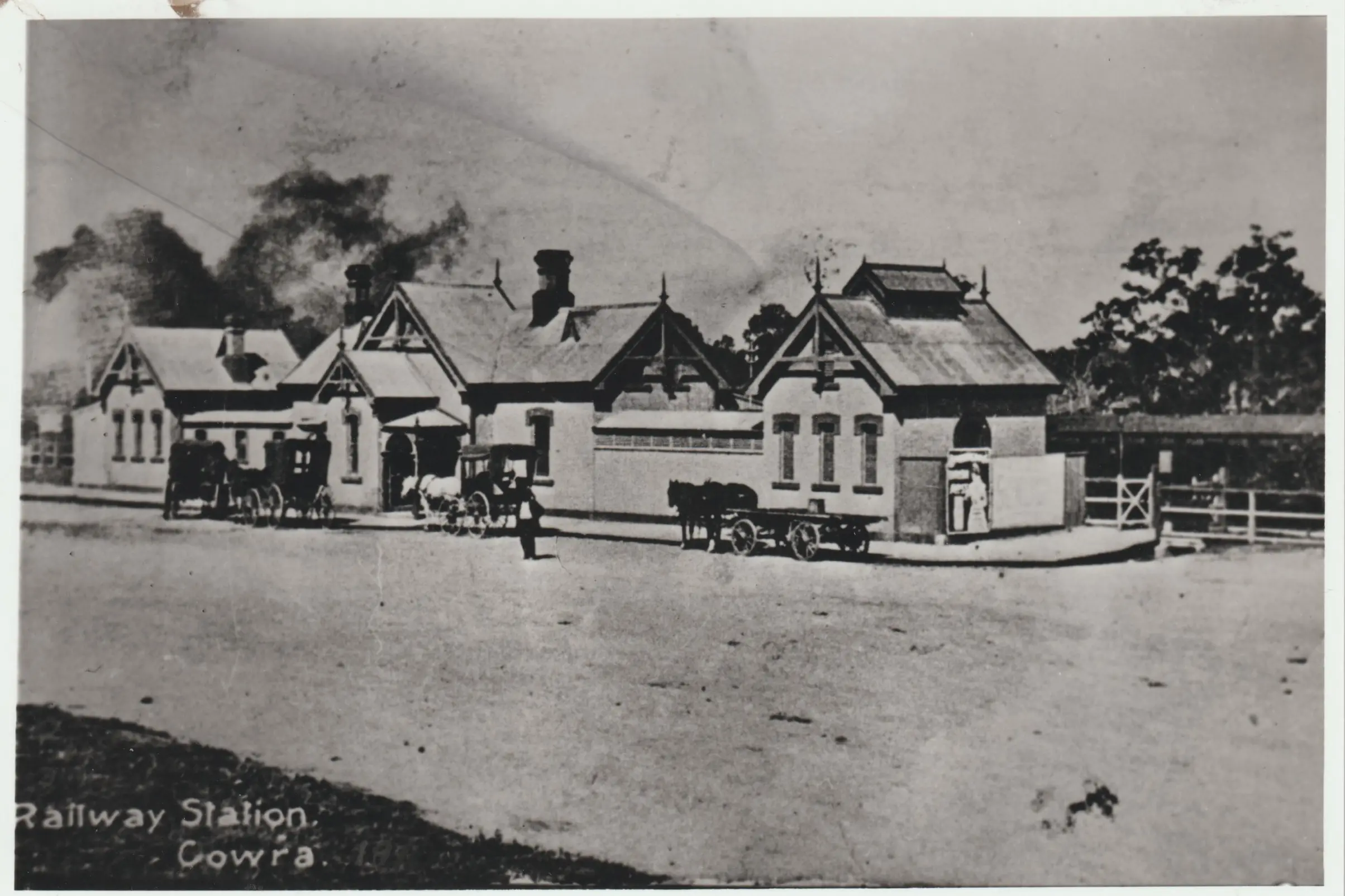 <p>One of the seminar topics will be NSW Railways records. This photo from the Cowra Family History Group Photographic Collection is Cowra Railway Station circa 1910. Note the horse-drawn cabs and carrier delivery wagon at the front of the station.</p>\\n