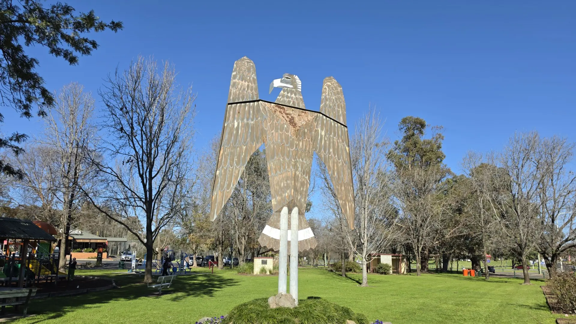 Eagle sculpture landing up in the air