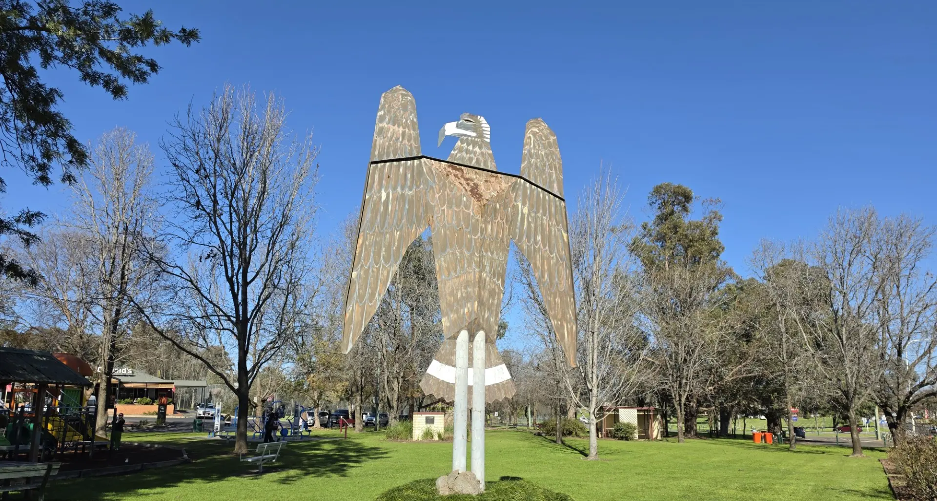 Eagle sculpture landing up in the air