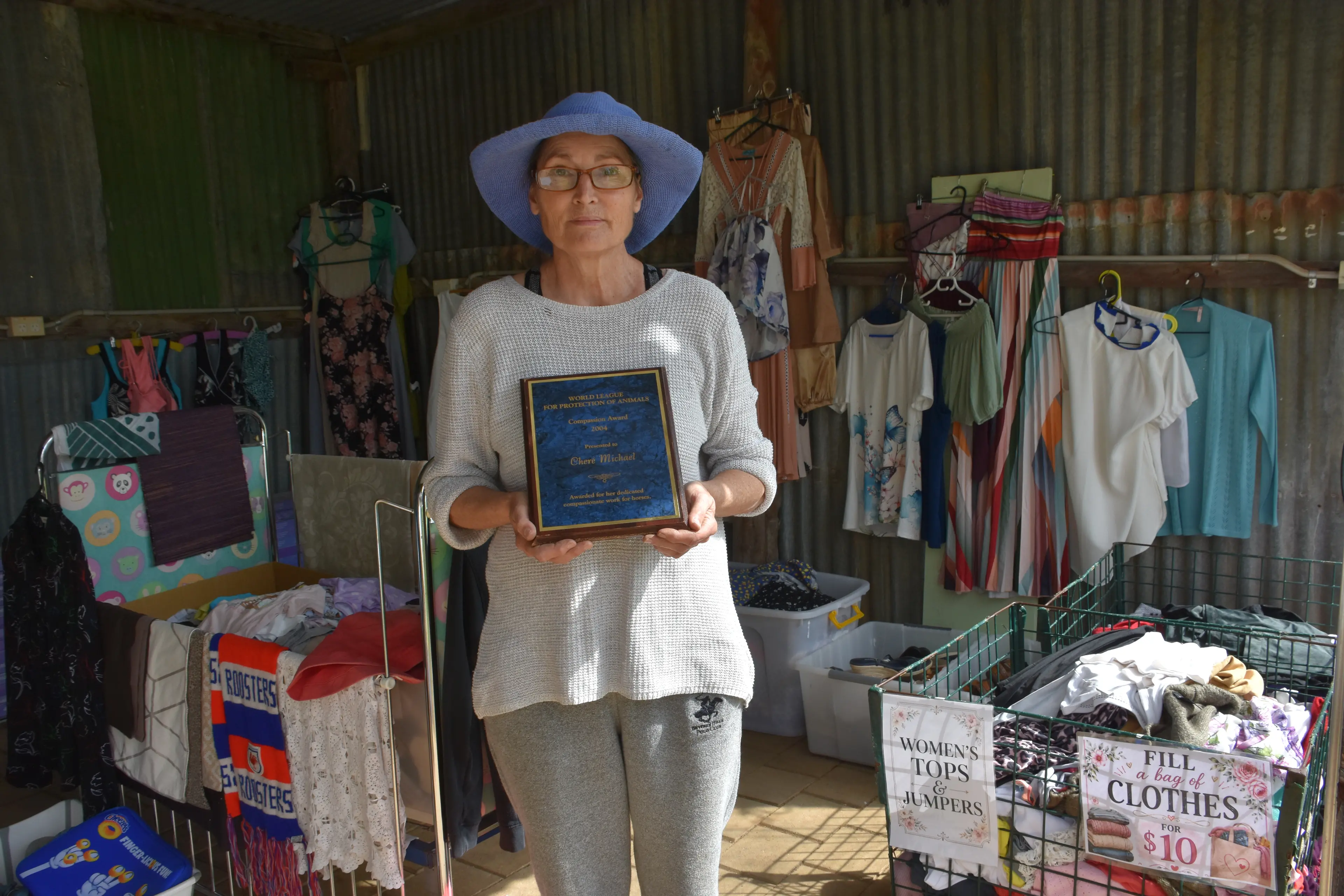 <p>Chere Michelle featured with her Compassion Award from the World League for the Protection of Animals. PHOTO: Simone Sheridan</p>\\n