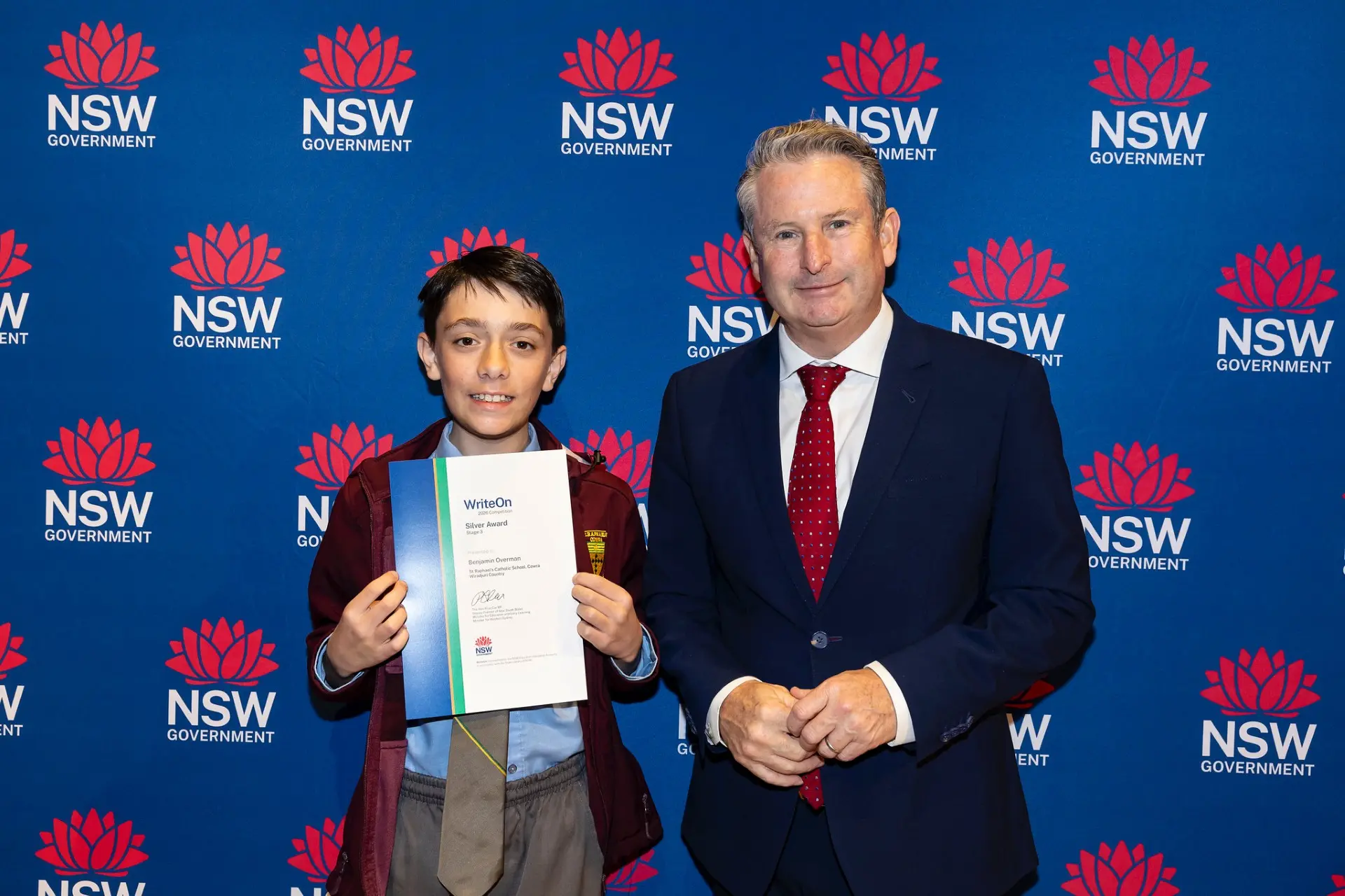 <p>Benjamin Overmann receiving his award at the State Library in Sydney.</p>\\n