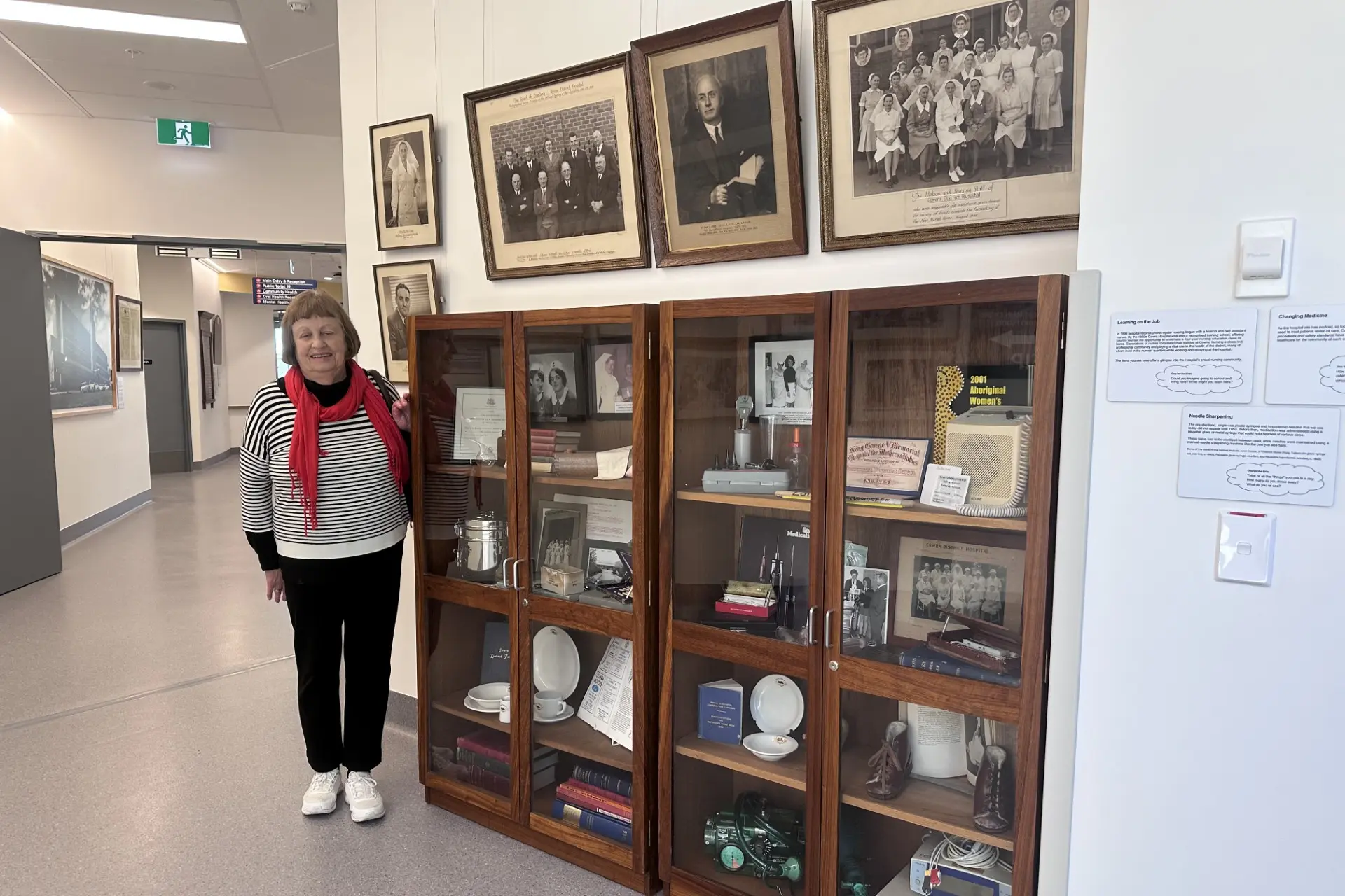<p>Carole Doyle with the cabinet that displays the history of nursing within the Cowra Hospital.</p>\\n