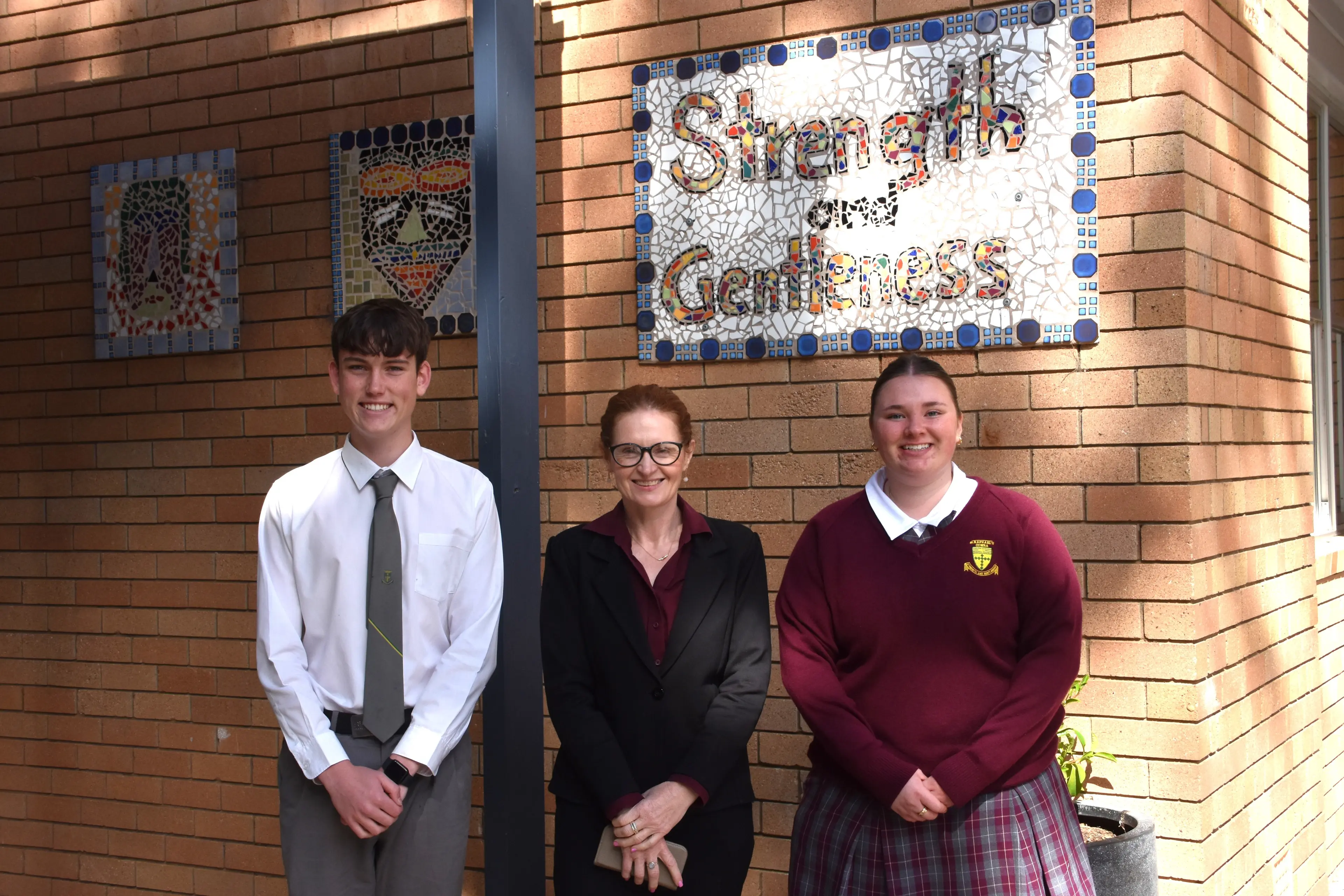 <p>Owen Holmes with Japanese teacher and former Seikei exchange student, Tamatha Olbourne, with Emma Haslam who participated in the program last year. PHOTO: Simone Sheridan</p>\\n